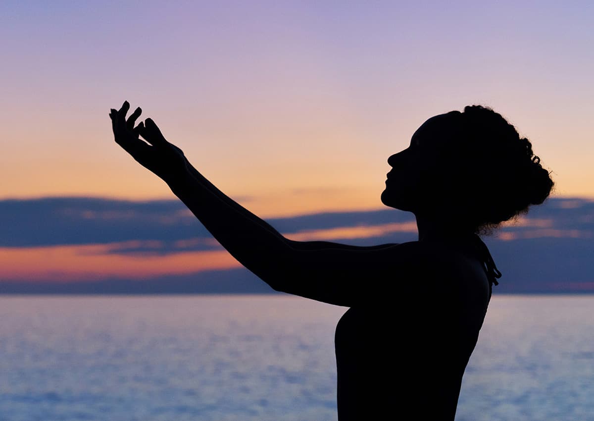 silhouette of woman in a yoga pose 4