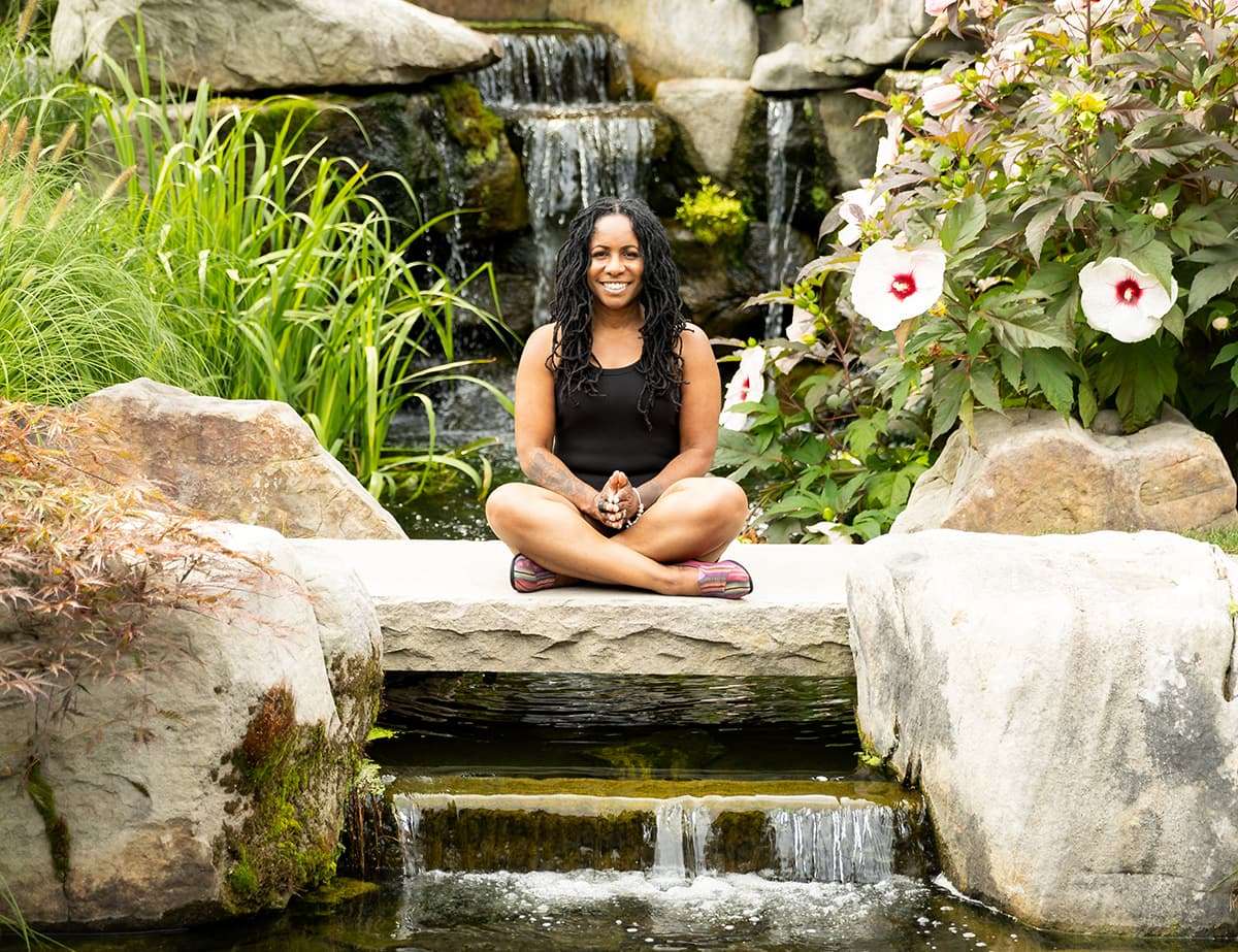 LOVIEConnects | Lovie Jackson Foster sitting outdoors.
